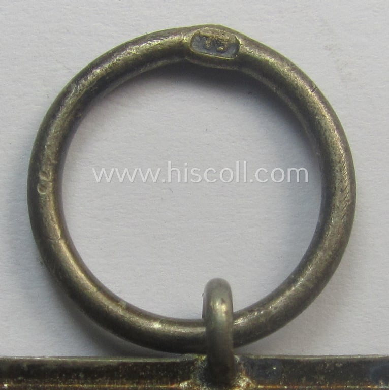 Superb - and very rarely found! - 'Eisernes Kreuz 2. Kl.' (ie. Iron Cross 2nd Class) being a maker- (ie. '75'-) marked example that comes stored in its period 'Zellstoff'-based pouch by the: 'Julius Maurer'-company