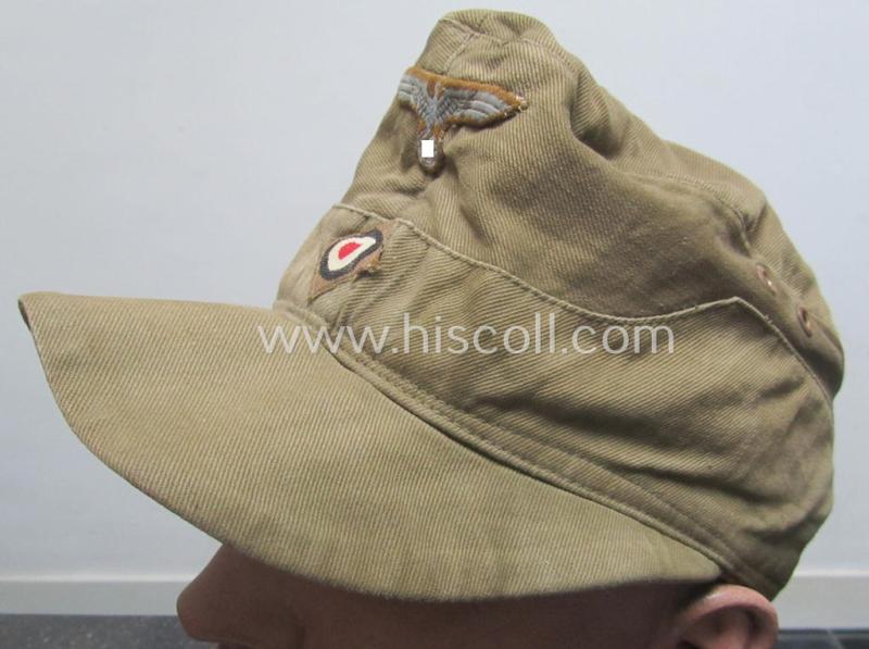 WH (Heeres), 'M41-pattern', tropical-issued field-cap (ie.: 'Tropen-Einheitsfeldmütze') being an (approx.) 57-cms.-sized example that is neatly maker- (ie. 'RbN. nr.'-) marked and that comes in a moderately worn- ie. used, condition