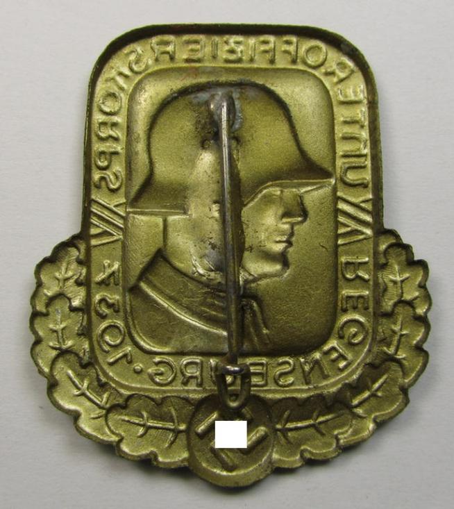 Golden-toned- (and/or tin-based) WH (Heeres) related day-badge (ie. 'tinnie' or: 'Veranstaltungsabzeichen') as was issued to commemorate the: 'Unteroffizierskorps - Regensburg - 1937'