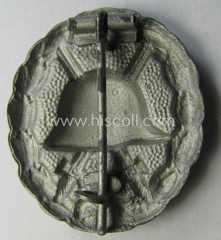 WWI-pattern, steel-based silver-class wound-badge (ie.: 'Verwundeten Abzeichen in Silber') being a detailed (and magnetic) example that comes in a moderately used- ie. most certainly worn, condition