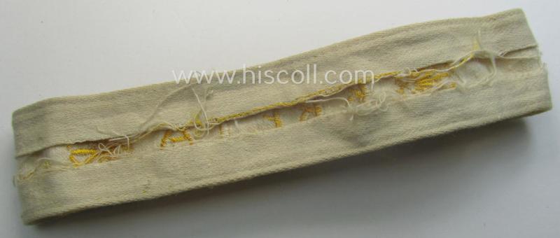 WH cuff-title (ie. 'Ärmelstreifen') entitled: 'Kreta' (being an example that bears a printed 'RbN.'-numeral and that comes in an issued-, clearly worn- and/or most certainly once tunic-attached, condition)