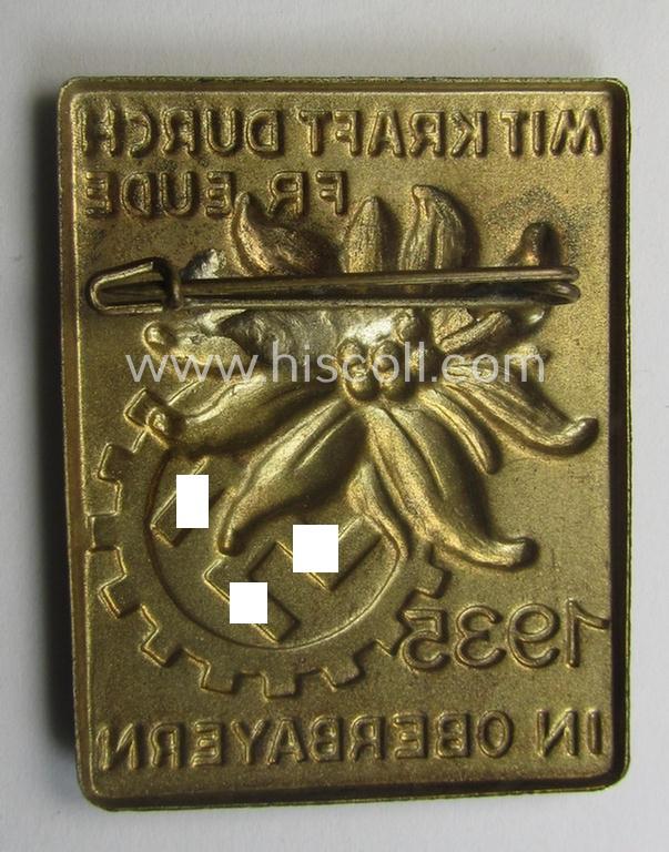 Commemorative, TR-period day-badge (ie. 'tinnie') as issued to commemorate a DAF- (ie. KDF-) related gathering depicting an illustration of an 'Edelweiss'-flower and DAF-logo coupled with the text: 'Mit Kraft durch Freude in Oberbayern 1935'