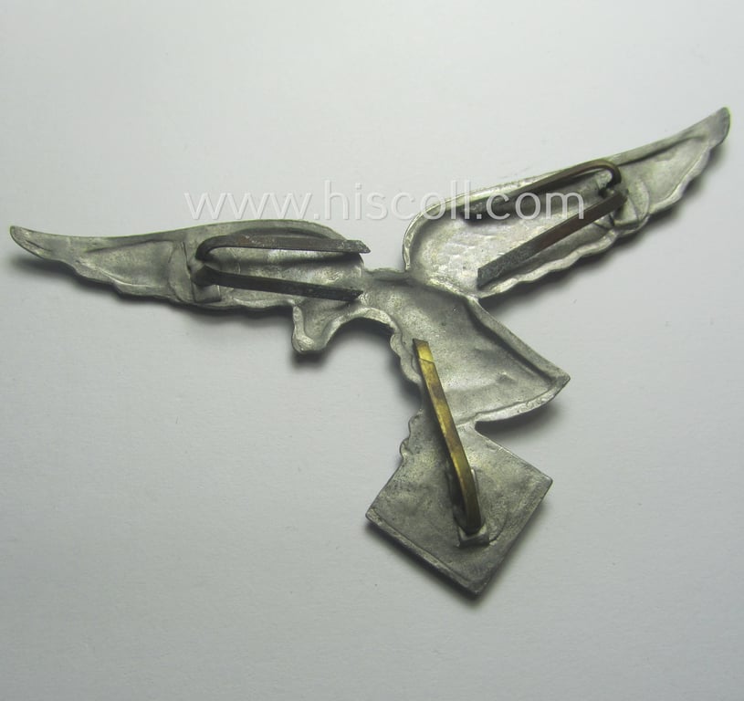 Attractive, silver-coloured- (and/or I deem tin-based), WH (Luftwaffe) related so-called: 'photo-album-device', being a larger-sized & non-maker-marked example depicting an early-period- ie. 'down-tailed' eagle-device