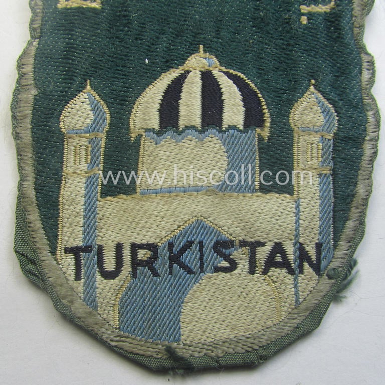 Superb - truly used- and/or worn! - 'BeVo'-type armshield (of the first pattern!) entitled: 'Biz Alla Bilen - Turkistan' (as intended for a volunteer who served within the: 'Deutsche Wehrmacht' ie. within the: 'Turkistanisches Legion')