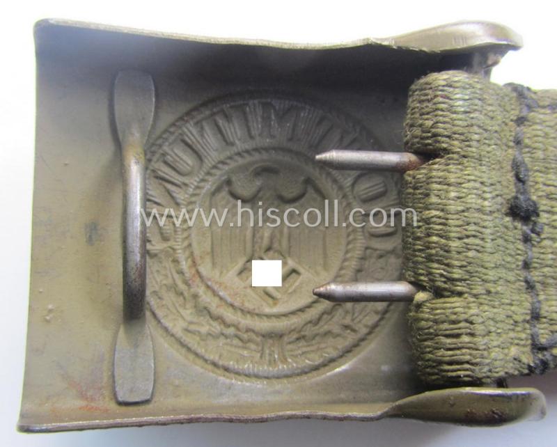 WH (Heeres) 'tropical-issued' belt-buckle being a non-maker-marked (and/or period re-sprayed!) bluish-coloured example that comes mounted onto its original, greenish-coloured- (and/or: 'webbing'-based-) tab