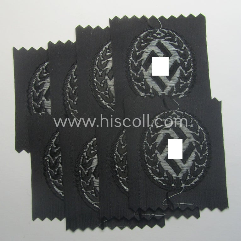 Officer's- (ie. evt. NCO-) type, so-called: 'Schutzmannschaften' (or: 'Schuma') cap-badge as executed in greyish-silver-coloured (so-called: BeVo 'flat-wire'-woven!) thread onto a black-coloured- (ie. 'SS-Polizei'- ie. 'SD'-related-) background