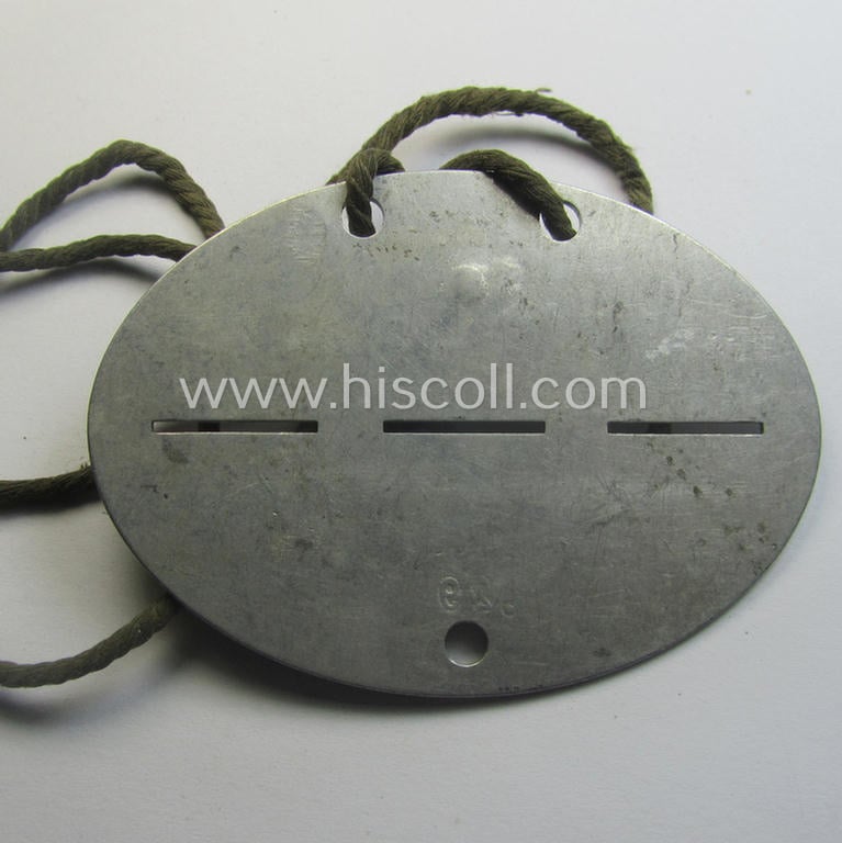 Aluminium-based, WH (Heeres) (ie. 'Infanterie o. Deutsches Reichsheer'-related) ID-disc bearing the clearly stamped unit-designation that reads: 'Stab/Inf. Ers.Batl. 29 - Deutsches Reichsheer' and that comes  mounted onto its (period-attached) cord