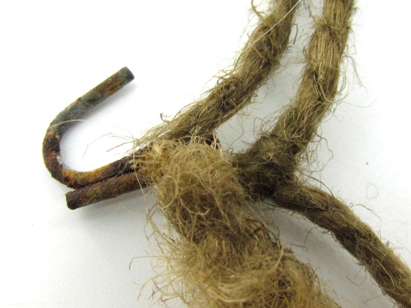 Complete late war German helmet net with attachment hooks