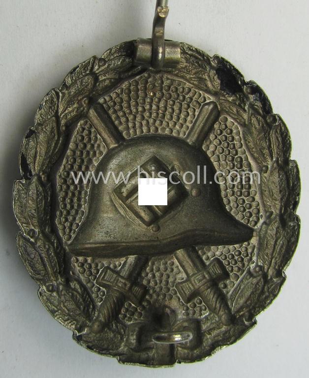 Attractive, early-pattern, black-class wound-badge (ie.: 'Verwundeten Abzeichen in Schwarz') being a detailed so-called: 'Spanish Civil-War'-version that comes in a moderately used- and/or worn, condition