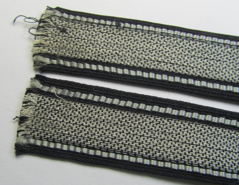 Superb - and truly rarely encountered! - example of a Waffen-SS, 'semi-BeVo'-pattern, EM- (ie. NCO-) type cuff-title (ie. 'Ärmelstreifen') as was intended for a member serving within the: 'SS-Feldgendarmerie'