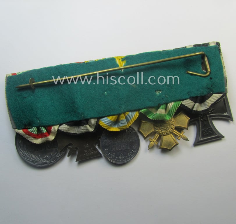 Three-pieced, (pre) 'WWI'-related medal-bar grouping (ie. 'Ordenspange-Satz') resp. depicting a WWI-period: 'EKII. Kl.', a: Sachs. 'Ehrenkreuz mit Schw.', a: 'Friedrich August Medaille in Silb.', a: 'FKK 1914-18' and an Austrian WWI-comm. medal