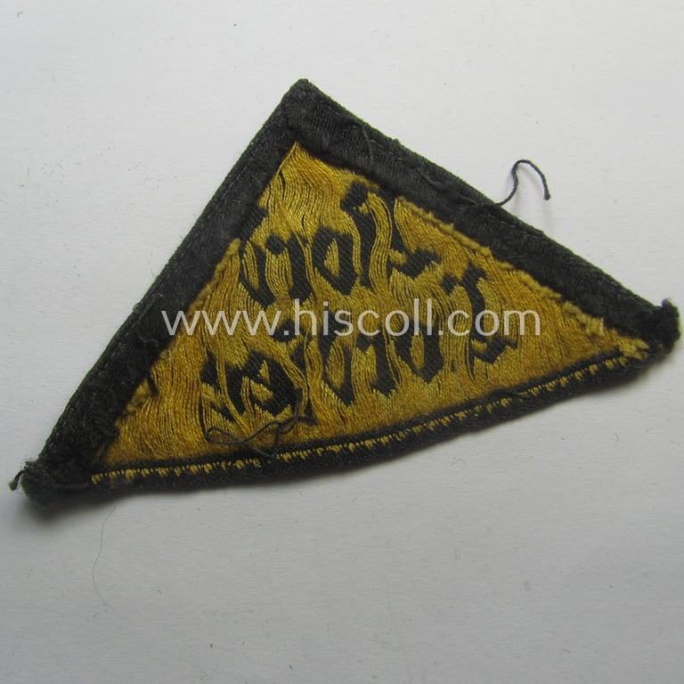 Truly used and/or worn, 'HJ' ('Hitlerjugend') district-triangle (ie. 'Gebietsdreieck') entitled: 'Nord Nordsee'