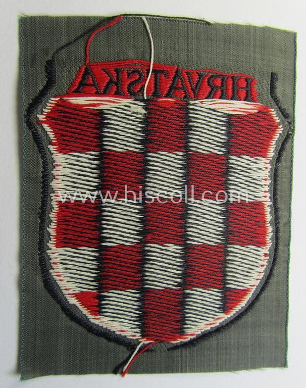 Attractive, multi-coloured- and/or 'BeVo'-woven armshield (ie. 'Ärmelschild') entitled: 'Hrvatska' as was intended for usage by a volunteer who served within the 'Deutsche Wehrmacht' ie. within the 'Kroatische Legion'