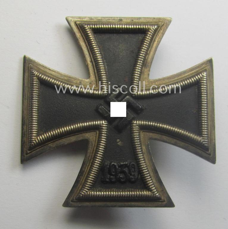 Fully untouched, 'Eisernes Kreuz 1. Kl.' (or: Iron Cross 1st class) being a typical, maker- (ie. '6.'-) marked example by the maker (ie. 'Hersteller'): 'Fritz Zimmermann' and that comes as issued and worn