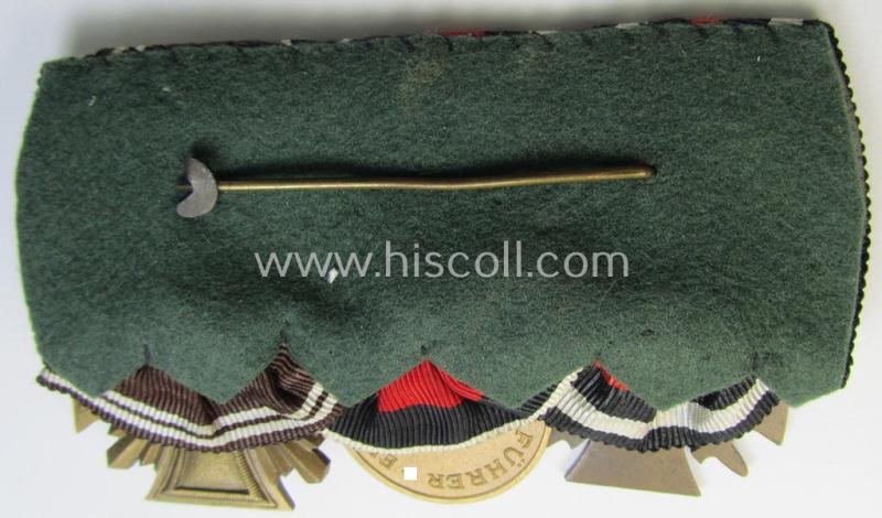 Superb, 3-pieced N.S.D.A.P.-related medal-bar (ie. 'Ordenspange') showing resp. an: 'FKK 1914-18 mit Schw.', a: Czech 'Anschluss' medal and a: 'N.S.D.A.P.-DA. in Bronze' (ie. '3. St. für 10 Jahre t. D.')