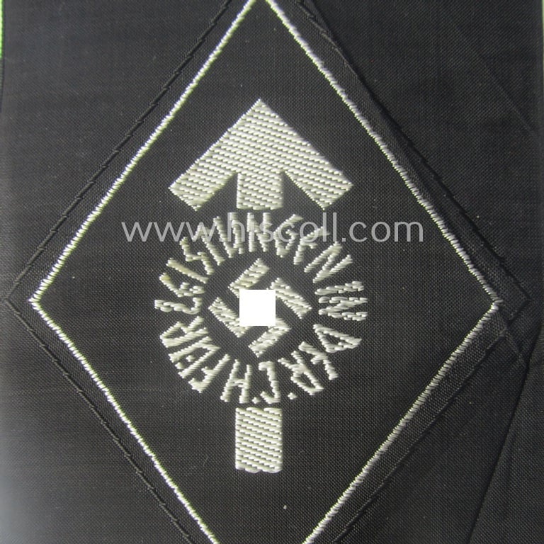 HJ- (ie. 'Hitlerjugend') 'Leistungsabzeichen in Silber in Stoff' that retains its 'RzM'-etiket