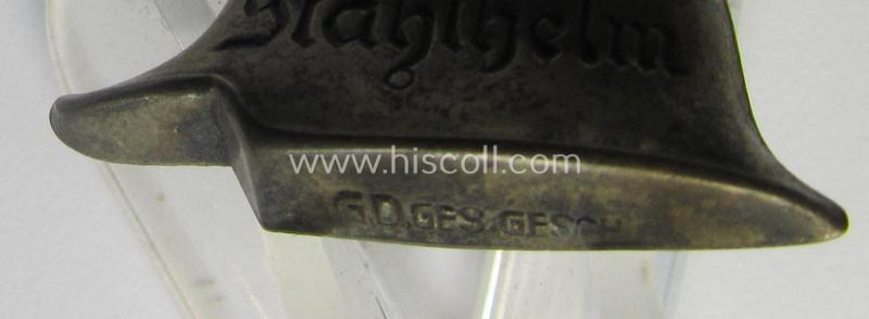 Attractive lapel-pin (ie. 'Zivilabzeichen') denoting membership within: 'Der Stahlhelm' - Bund der Frontsoldaten (Sta)' being a neatly maker- (ie. 'G.D.'-) marked example that is executed in silvered metal (ie. 'Buntmetall')