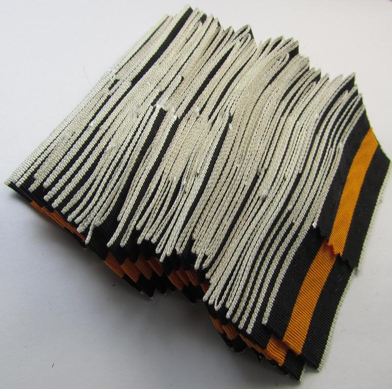 Neat spare-part: a bright-orange-coloured(!), non-confectioned- (ie. full length- and 19 cms. long-sized-) ribbon (ie. 'Bandabschitt') for the: WH Czech occupation-medal: '1 October 1938' and that comes in 'virtually mint ie. unissued condition