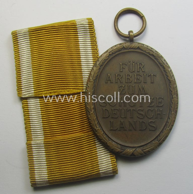 Medal-set: 'Deutsches Schutzwall Ehrenzeichen' (aka: 'Westwall'-medal) being a non-maker-marked- and/or: 'Buntmetall'-based specimen