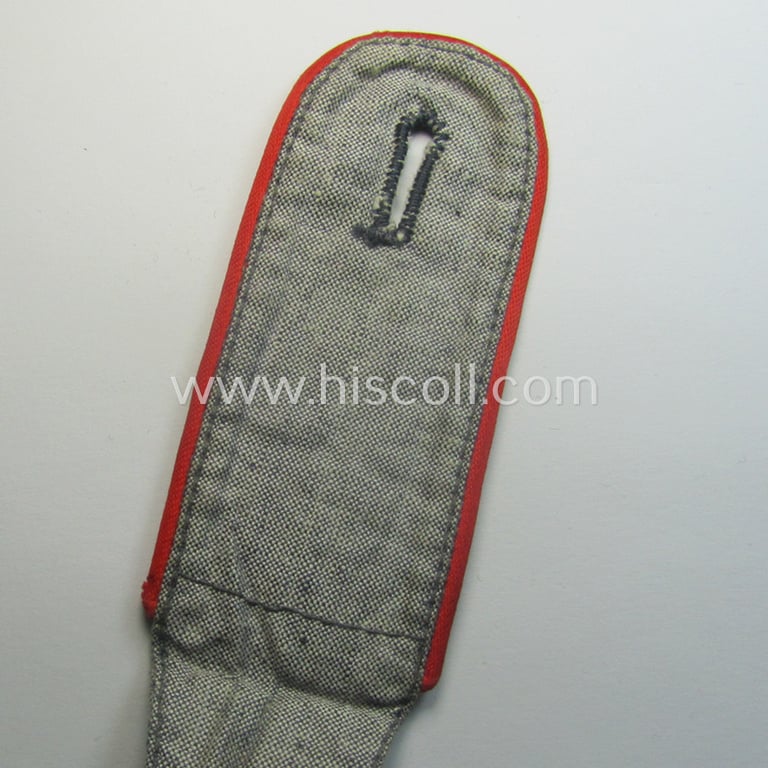 Single, WH (LW) 'blaumelliertes' shoulderstrap: 'Soldat der Flak-Art.Trpn.'