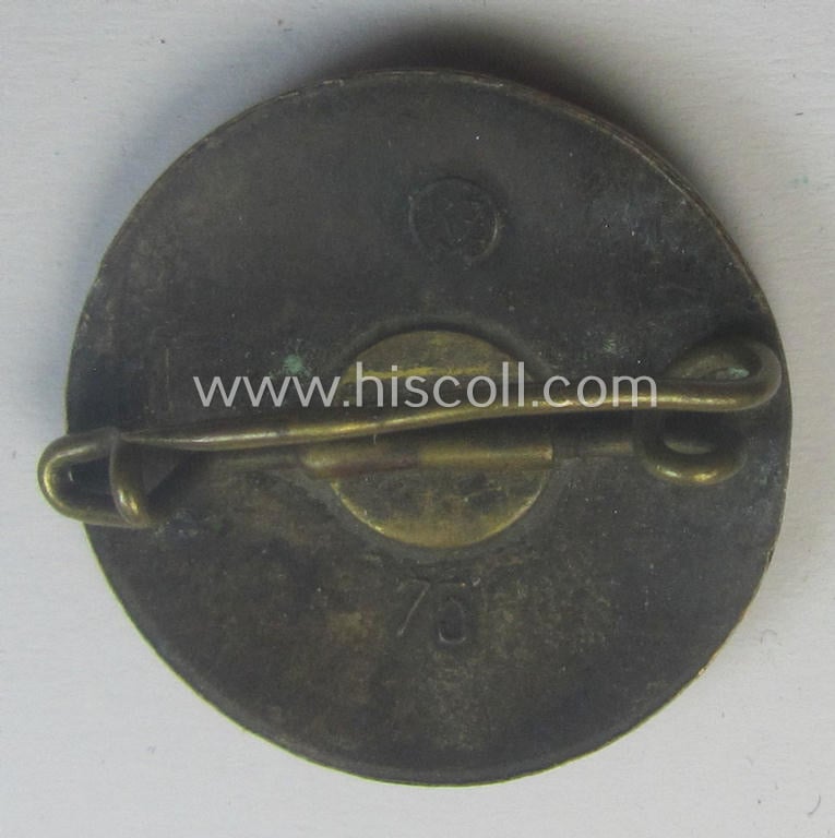 'N.S.D.A.P. - Parteiabzeichen' showing the makers'-designation: 'RzM' and/or: '75'