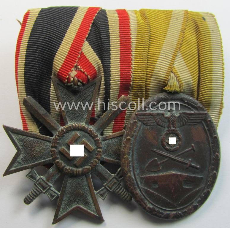 Neat - and clearly used! - two-pieced medal-bar (ie. 'Ordenspange') showing resp. a: 'Kriegsverdienstkreuz 2. Klasse mit Schwn.' and a: 'Westwall'-medal that come period-mounted as a: 'Doppelspange'