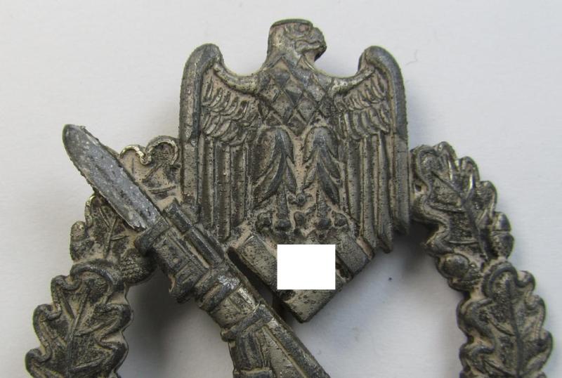 Moderately worn, 'Infanterie Sturmabzeichen in Silber' being a maker- (ie. 'MK' in a triangle-) marked (and/or minimally converse- ie. vaulted-) example by a to date still unidentified maker as was executed in silvered zinc-based metal ('Feinzin...