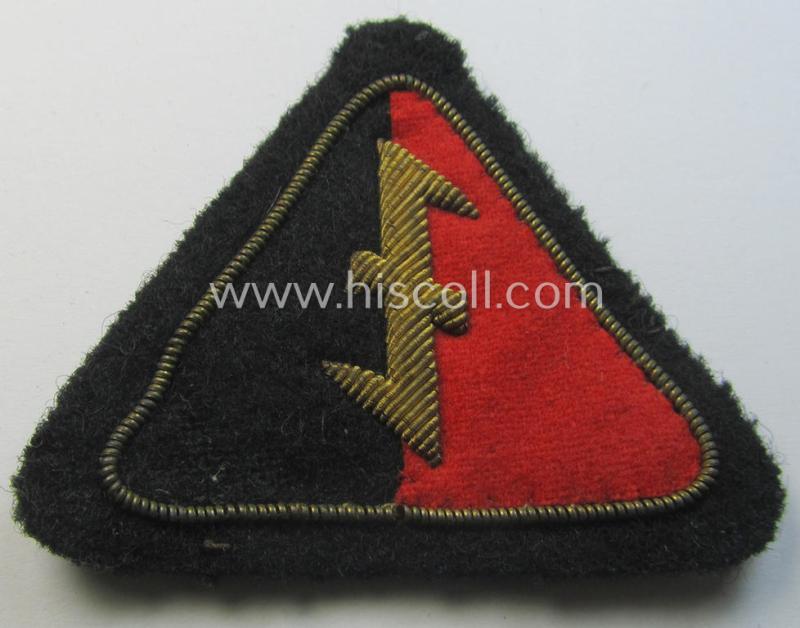 Attractive - and presumably Dutch-produced - example of an early-pattern (and truly neatly hand-embroidered!) WA- (or: 'Weerafdelingen'-) related 'Wolfshook'-cap-triangle as was intended for usage on the black-coloured visor-caps