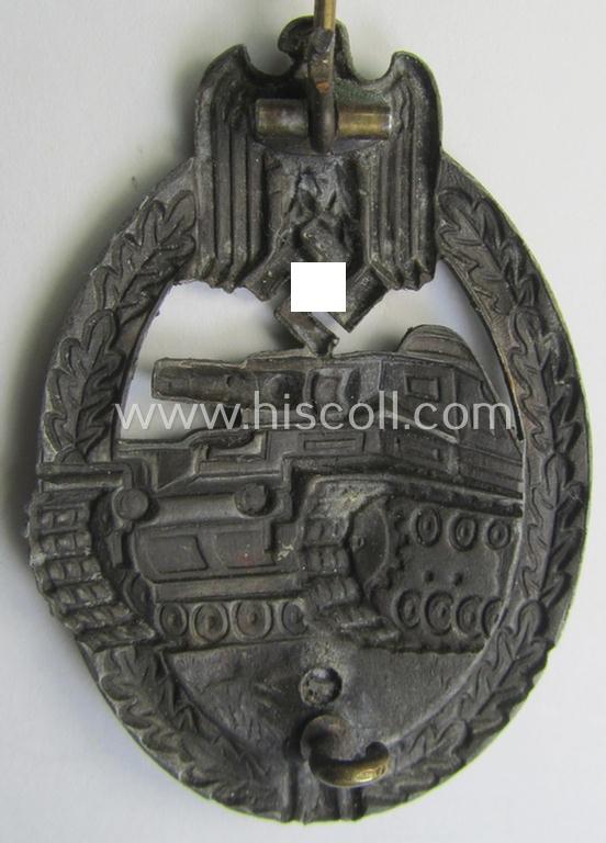 'Panzerkampfabzeichen in Bronze' (or: hollow-back, bronze-class panzer assault badge or PAB) being a neat zinc- (ie. 'Feinzink'-) version (of the so-called: 'first'-pattern) as was procuced by the: 'Paul Meybauer'-company