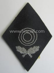 'SS'-related sleeve-diamond (ie.: 'Ärmelraute o. Schiessauszeichnung der 1....