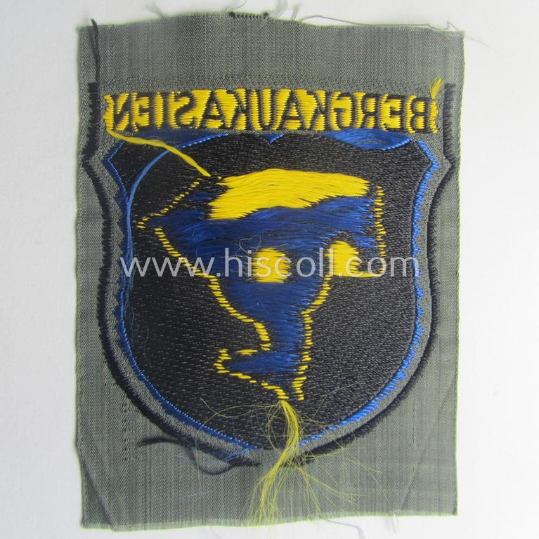 'BeVo'-type armshield (of the second pattern!) entitled: 'Bergkaukasien', being a piece as intended for a volunteer who served within the 'Deutsche Wehrmacht' ie. within the 'Berg- o. Nord-Kaukasisches Legion'