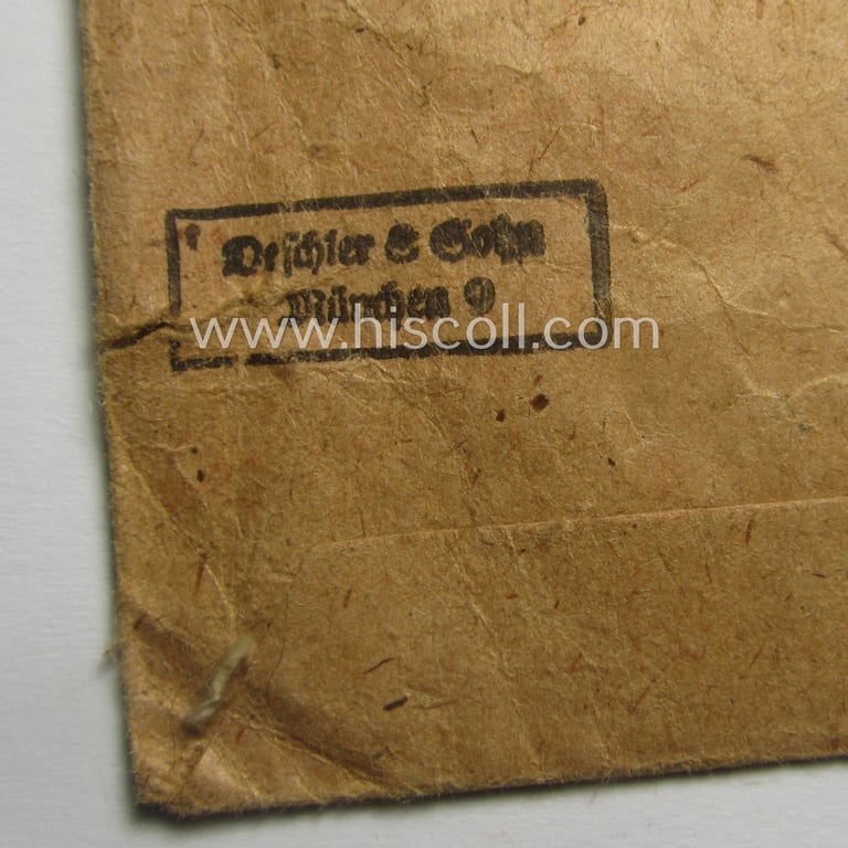 'Errinnerungsmedaille für die Spanischen Freiwilligen im Kampf gegen den Bolschevismus' being a (typical) non-maker-marked example by: 'Deschler & Sohn' in its 'Zellstoff'-based pouch