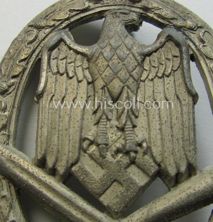 Attractive, 'Allgemeines Sturmabzeichen' (or: General Assault Badge ie. GAB) being a typical unmarked, zinc-based- (ie. 'Feinzink'-) and/or: 'semi-hollow-back'-version as was (I deem) produced by the: 'Rudolf Karneth'-company