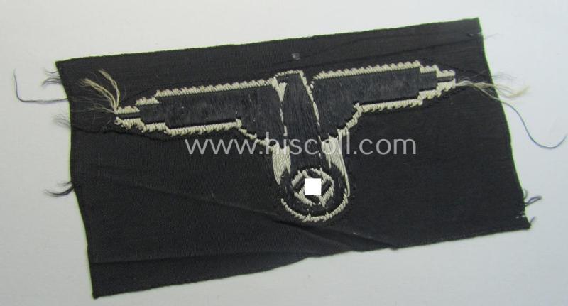 Mid- (ie. later-war-) pattern, 'SS' (ie. 'Waffen-SS') so-called: 'BeVo-weave-style', enlisted-mens'- ie. NCO-pattern arm-eagle (ie. 'Ärmeladler für Mannschaften u. Unterführer') as was intended for usage by the various Waffen-SS troops