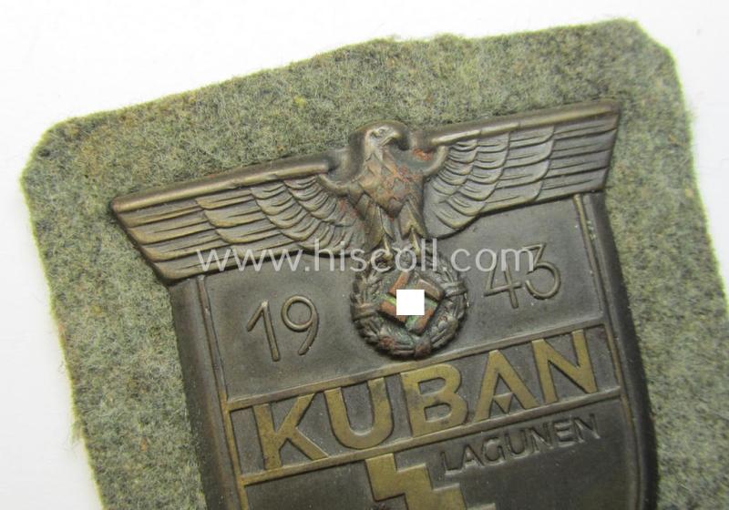 Very attractive - and actually scarcely encountered! - WH (Heeres ie. Waffen-SS) 'Kuban'-campaign-shield that comes mounted onto its original field-grey-coloured- and/or woolen-based 'backing'