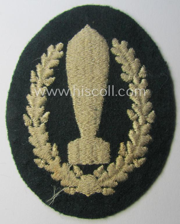 WH (Heeres) 'Nebelwerfer Richtkannonier'- (or: qualified smoke-troops canon-operator) patch as executed in the neat 'machine-embroidered'-pattern