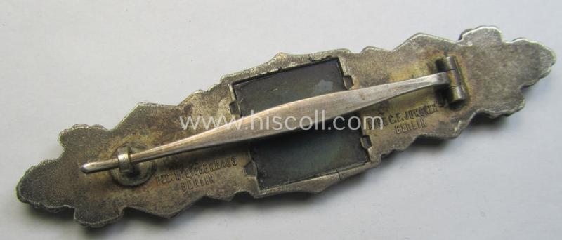 Super - albeit damaged! - 'Nahkampfspange in Silber' (or: silver-class close-combat clasp ie. CCC) being a neatly maker-marked- and/or non-converse-shaped specimen as was produced by the: 'C.F. Juncker'-company