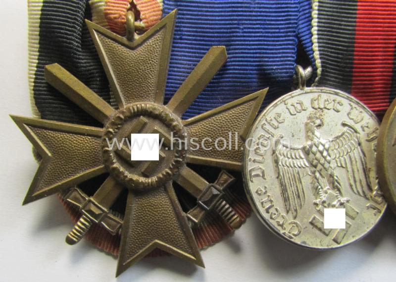 Three-pieced medal-bar (ie. 'Ordenspange') respectively depicting a: 'KvK II. Klasse m. Schw.', a: WH (Heeres o. KM) so-called: 'Dienstauszeichnung für 4 Jahre Treue Dienste' and a: Czech 'Anschluss'-medal: '1 Oktober 1938'