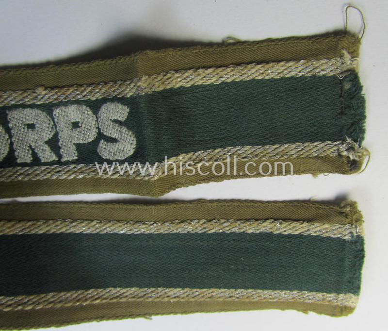 Attractive, 'BeVo'-like cuff-title (ie. 'Ärmelstreifen') entitled: 'Afrikakorps' being a with certainty issued and truly worn example that comes in an overall nice- (ie. minimally shortened-  and/or once tunic-attached-), condition