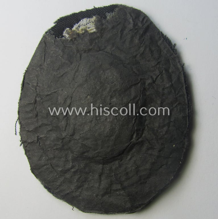 WH (Luftwaffe) 'Fallschirmschützen-Abzeichen in Stoff' (or: cloth-based paratroopers' jump-badge) that is nicely machine-embroidered and being of the so-called: 'padded version'