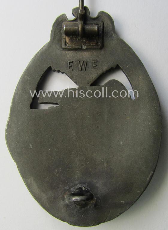 Attractive, 'Panzerkampfabzeichen in Bronze' (or: bronze panzer-assault badge or PAB) being a maker- (ie. 'EWE'-) marked- and/or zinc- (ie. 'Feinzink'-) based example (that comes in an overall very nice and only minimally used- ie. worn conditi...