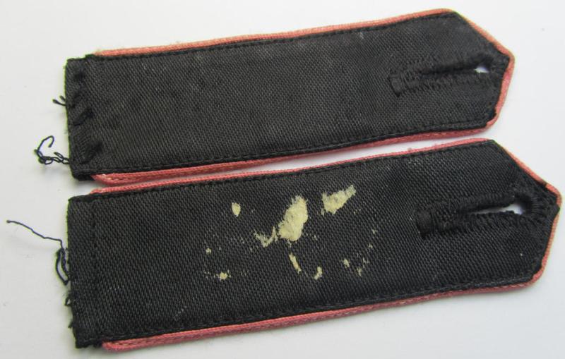 Moderately worn - and fully matching! - pair of bright-pink-piped so-called: 'Motor-HJ'-shoulderstraps as was intended for a: 'Hitlerjunge' who served within the 'Bann 703' (703 = 'Bann Zweibrücken' in the 'Gebiet West Saarpfalz/Westmark'