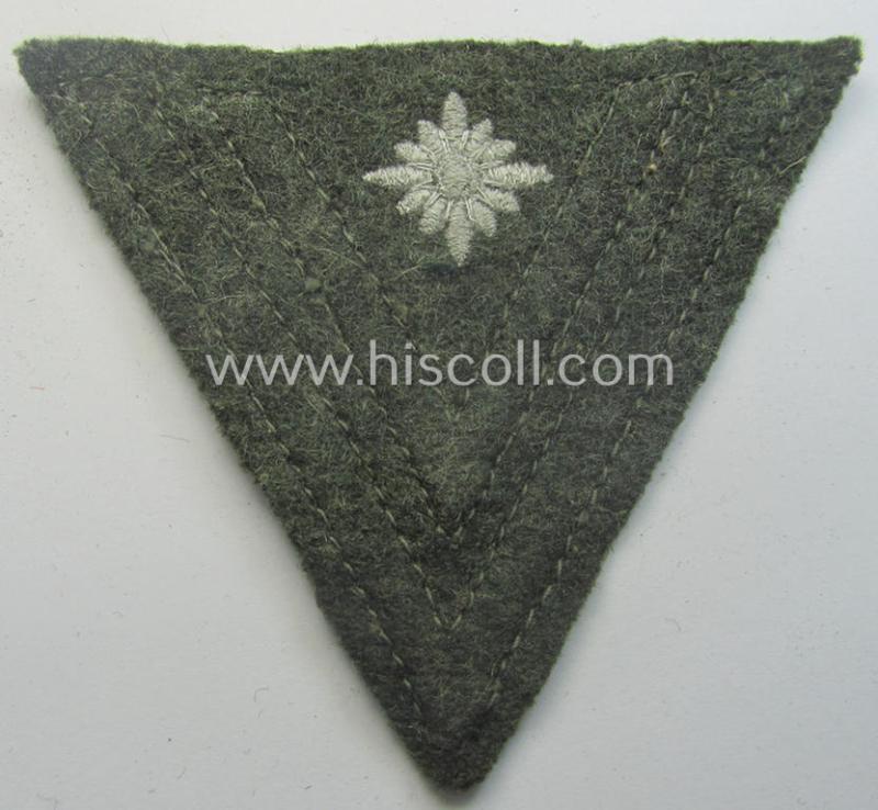 WH (Heeres) 'Armwinkel' (or: arm-chevron) as executed on typical field-grey-coloured wool as was specifically intended for usage by a soldier with the (unusually encountered!) rank of: 'Stabsgefreiter'