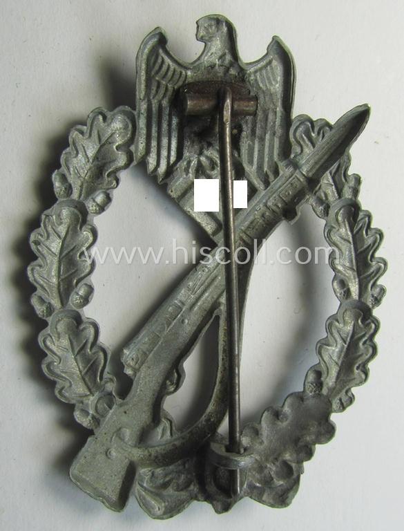 'Infanterie Sturmabzeichen in Silber', being an unmarked (and/or very converse- ie. vaulted-) 'hollow-back' example by the maker: 'Friedrich Linden' (ie. 'F.L.L.') as was executed in silver-coloured, zinc-based metal (ie. 'Feinzink')