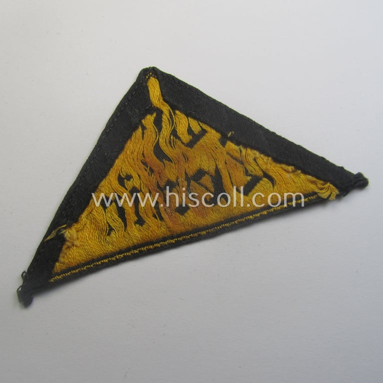 Scarcely found, 'HJ' ('Hitlerjugend') district-triangle (ie. 'Gebietsdreieck') entitled: 'Ost Berlin' (being a clearly used example that is void of an 'RzM'-etiket)