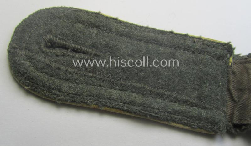 Single, mid-war-period, so-called: 'M43'-pattern, WH (Heeres) NCO-type shoulderstrap as piped in the bright-yellow-coloured branchcolour as was intended for usage by an: 'Uffz. der Nachrichten-Trpn.'