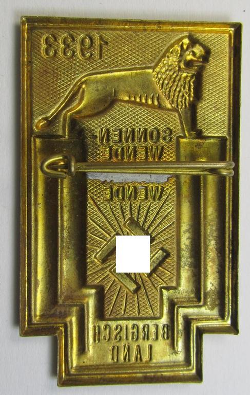 Commemorative, tin-based- and/or: golden-coloured, early-period N.S.D.A.P.-related 'tinnie' being a non-maker marked example depicting a lion and 'swastika'-sunburst-device and bearing the text: 'Sonnenwende Zeitenwende - Bergischland - 1933'