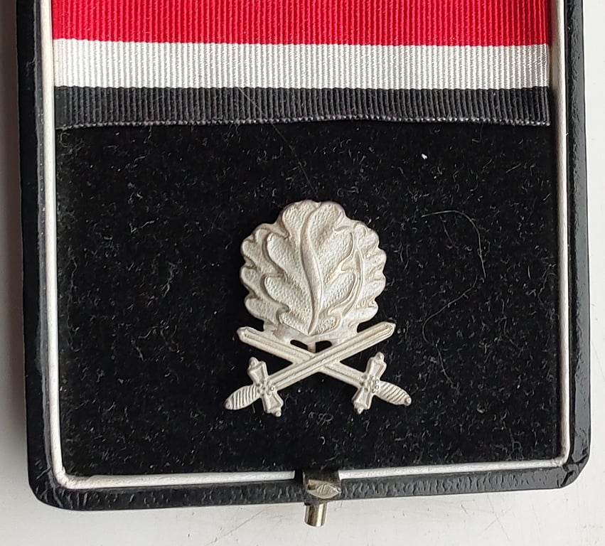 A cased LDO Oak leaves and swords to the Knights Cross