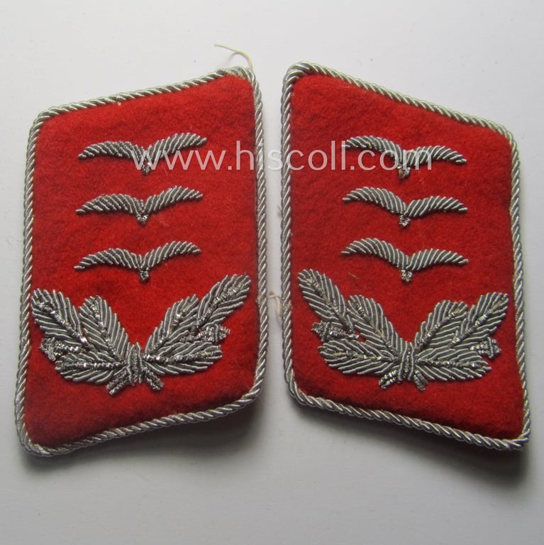 Truly used- and/or worn, 4-pieced WH (LW) insignia-set comprising of a pair of hand-embroidered, WH (Luftwaffe) officers'-type collar-patches and dito shoulderboards: 'Hauptmann der Flak-Artillerie-Trpn.'