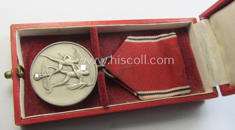 Attractive, WH Austrian-occupation- (ie. 'Anschluss'-) medal: '1. März 1938' being an attractive (and hardly tarnished) example that comes stored in its bright-red-coloured- and/or typical non-maker-marked etui as issued